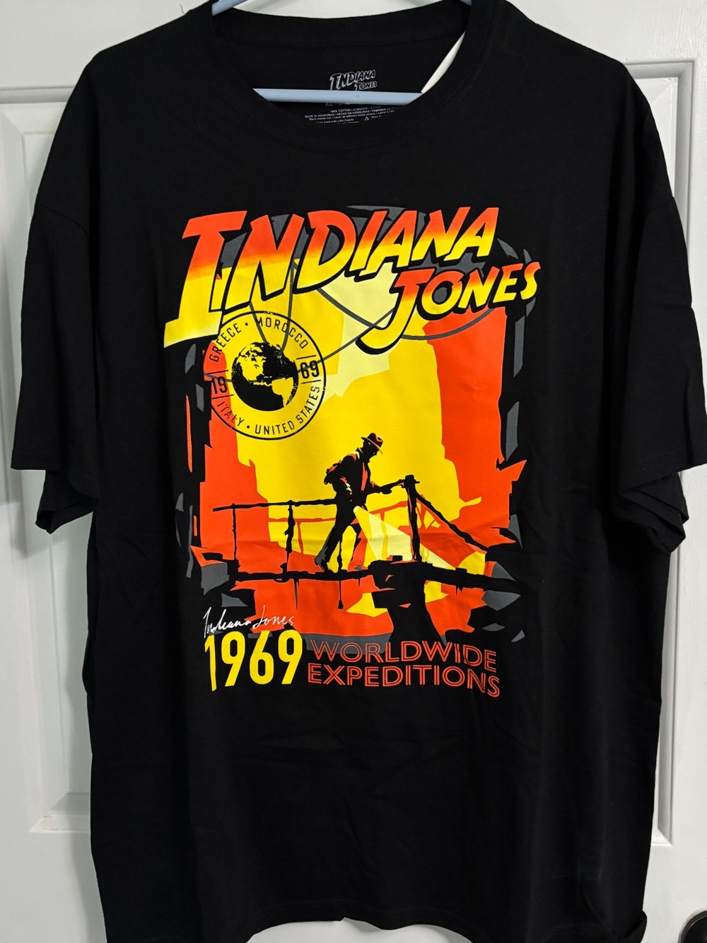 Men’s Indiana Jones 1969 Worldwide Expeditions Black Graphic Tee
